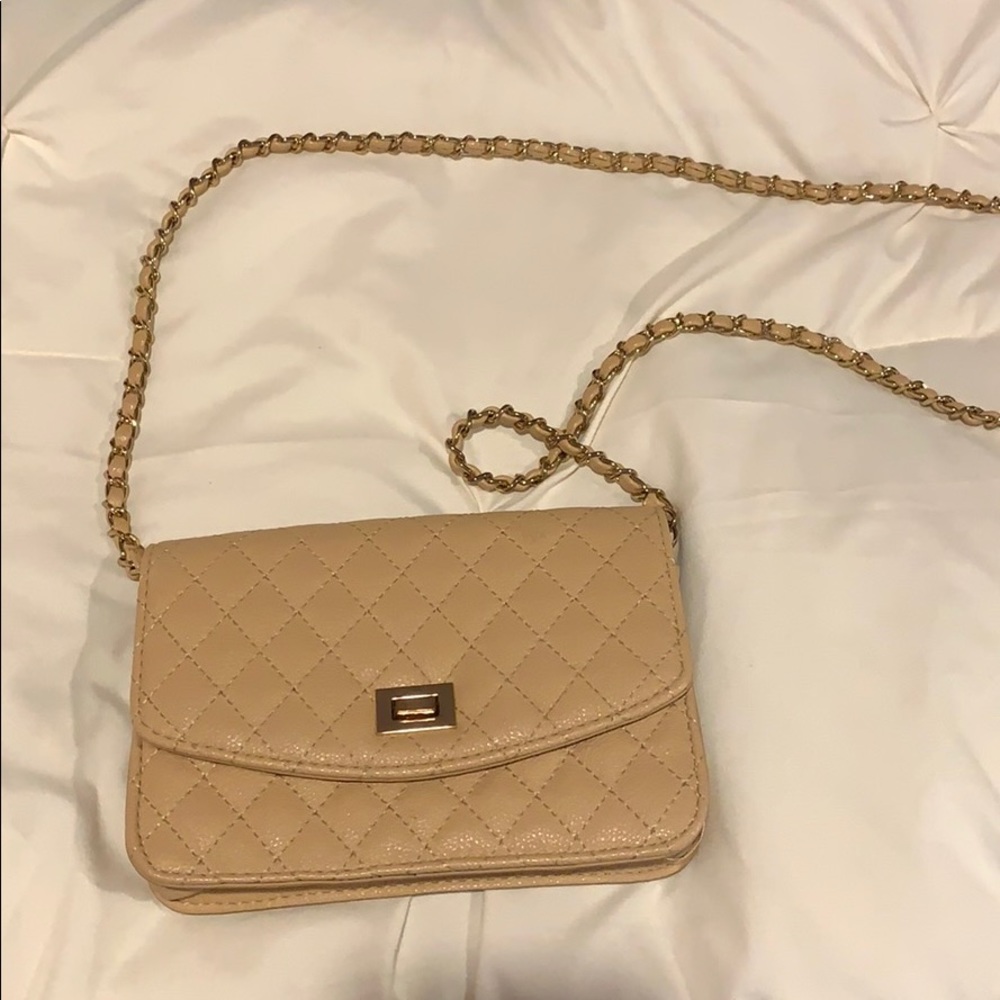 Tan cross body bag